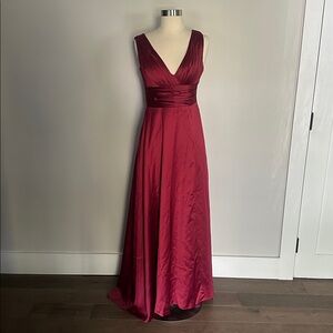 Elegant Red Sleeveless Gown - Brand New. Never worn.